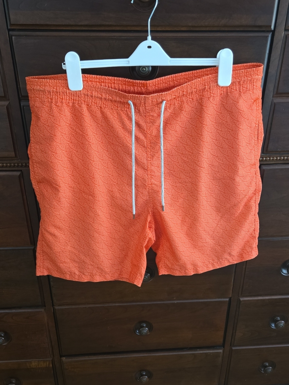 Kirkland Signature Men's Orange and White Pattern Swim Trunks. Size Large